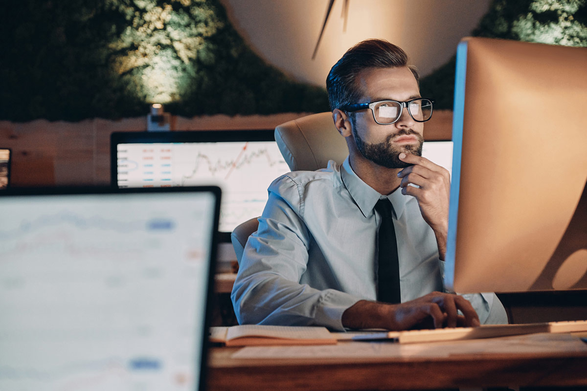 a professional man using a computer